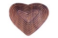 Wooden heart background. Closeup of handmade wooden heart isolated on a white background.