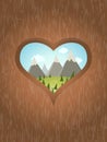 Wooden heart with idyllic view outside