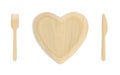 Wooden heart plate with fork and knife top view Royalty Free Stock Photo