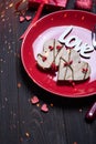 Wooden heart on red plate for valentine`s day with love concept for valentines day with sweet and romantic moment
