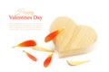 Wooden heart shape with orange petals, isolated, sample text Ha Royalty Free Stock Photo