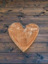 Wooden heart shape on wooden planking, rustic, romantic design