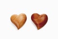 Wooden hearts, side by side