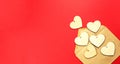 Wooden hearts spill out of an open envelope on a red background. Valentine`s Day, love letter, declaration of love, acquaintance. Royalty Free Stock Photo