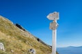 Wooden hiking trail sign with scenic view