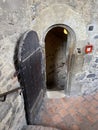 Wooden historical door to underground torture chamber, Prague, Czech Republic Royalty Free Stock Photo