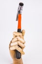 Wooden hand holding hammer