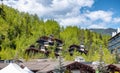 Wooden homes and forest in Vail, Colorado. Summer season with blue sky Royalty Free Stock Photo