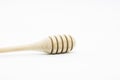 Wooden honey dipper isolated on white background Royalty Free Stock Photo