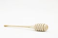 Wooden honey dipper isolated on white background Royalty Free Stock Photo