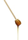 Wooden honey drizzler Royalty Free Stock Photo