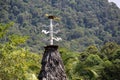 Wooden Hornbill on Top of Bidayuh House in Sarawak Borneo Jungle