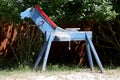 Wooden horse made for children in rural animal farm waiting young riders Royalty Free Stock Photo