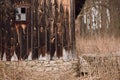 Wooden house in autumn forest. old cottage or log among trees in woods. aged wooden cabin in garden. ecotourism Royalty Free Stock Photo