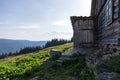 Wooden house in the background of a landscape. Royalty Free Stock Photo