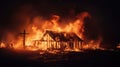 A wooden house or barn burning at night on fire Royalty Free Stock Photo