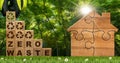 Wooden House and Blocks with Text Zero Waste and Recycling Symbols Royalty Free Stock Photo