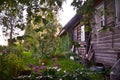 Wooden house with carved windows in Vologda Russia . Russian style in architecture. Rustic russian house with garden