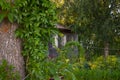 Wooden house with carved windows in Vologda Russia . Russian style in architecture. Rustic russian house with garden