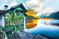 Wooden house on the coast of lake in Hallstatt village Austrian Royalty Free Stock Photo