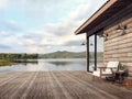 Wooden house exterior with beautiful lake and mountain view 3d render Royalty Free Stock Photo