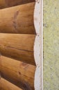 Wooden house facade wall layer with mineral wool, rock wool insulation. House insulation wall layers