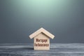 Wooden house figurine with inscription Mortgage forbearance. Borrower and lender agreements reduce or suspend mortgage loan Royalty Free Stock Photo