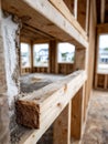 Wooden house frame under construction, showcasing carpentry work. Royalty Free Stock Photo