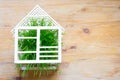 Wooden house and green grass abstract ecology construction concept Royalty Free Stock Photo