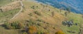 Panorama of country house under hill slope in Carpathian Mountains Royalty Free Stock Photo