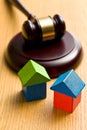 Wooden house and judge gavel Royalty Free Stock Photo