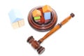 Wooden house and judge gavel on a white background. Is Royalty Free Stock Photo