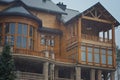 Wooden house, lantern, snow