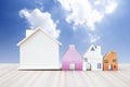 Wooden house medel collections over blurred sky background Royalty Free Stock Photo