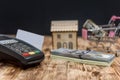 Wooden house model with terminal and credit card