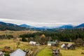 Wooden house in a mountains. Traditional small hut in Carpathian mountains on green meadow. Traditional rural landscape in Royalty Free Stock Photo