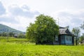 Wooden house with an outbuilding