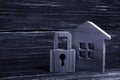 Wooden house with a padlock. House with a lock. Security Royalty Free Stock Photo