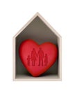 Wooden house and red heart with imprinted family shape Royalty Free Stock Photo