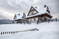 Wooden house under heavy snow, Zakopane, Poland Royalty Free Stock Photo