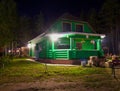 Wooden house in the village at night