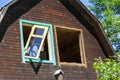 Worker removing old window Royalty Free Stock Photo