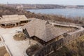 Wooden houses in the National Reserve `Zaporizhzhia Sich` on the island of Khortytsia in Zaporizhzhia. Ukraine.