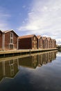 Wooden houses reflecting in the harbour in Hudiksvall