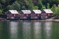 Wooden houses on the riverside, Flam at the Narrow Fjord in Vestland county, Norway