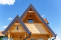 Wooden housing construction. The roof of a timber frame house. Frame modular house.
