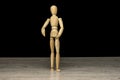 Wooden human mannequin standing