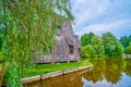 Wooden hunter\'s house on the islet in small forest lake, Styr, Zbrui, Ukraine