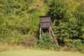 Wooden hunter's stand in the forest Royalty Free Stock Photo