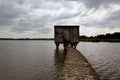 Wooden hunting cabin shore lake nature reserve, het Vinne, Zoutleeuw, Belgium Royalty Free Stock Photo